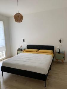 Postel nebo postele na pokoji v ubytování Maison Thiago