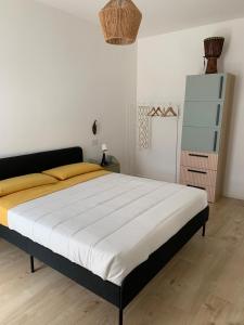 Postel nebo postele na pokoji v ubytování Maison Thiago
