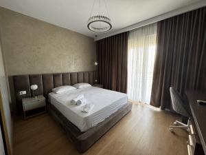 Postel nebo postele na pokoji v ubytování Prive Luxury Apartments