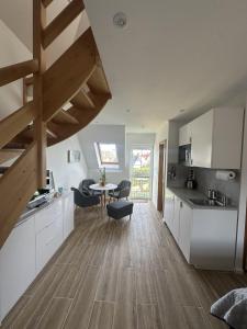 Η κουζίνα ή μικρή κουζίνα στο EUROPA APARTAMENTY