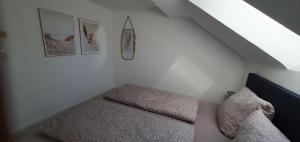 a room with a couch and some pictures on the wall at Silva2 in Kappel-Grafenhausen