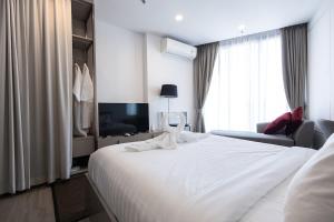TV/trung tâm giải trí tại Edge Central Pattaya - Luxury 1 BR Apartment - 6th Floor #51 +3 ảnh