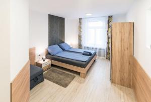 Posteľ alebo postele v izbe v ubytovaní Great Homes