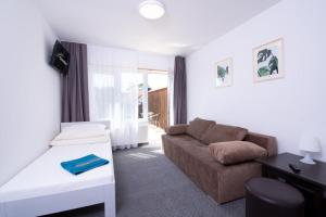 Postel nebo postele na pokoji v ubytování Ośrodek Wypoczynkowy Familifan + 37 fotografií