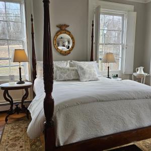 a bedroom with a large bed and two windows at Peach Grove House in Warwick +41 photos