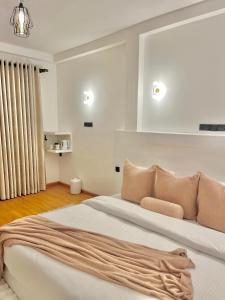 Llit o llits en una habitació de Seeming Lodge