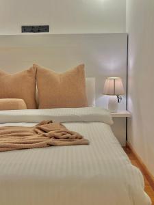 Llit o llits en una habitació de Seeming Lodge