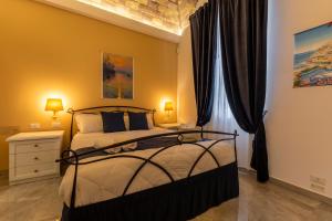 Кровать или кровати в номере Urban Beach Sirena