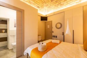 Кровать или кровати в номере Urban Beach Sirena