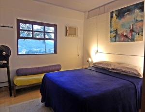 Postel nebo postele na pokoji v ubytování Chalés Van Gogh