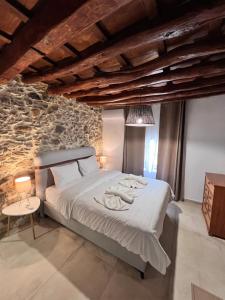 A bed or beds in a room at Harmony Family house