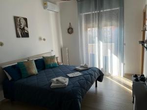 Postel nebo postele na pokoji v ubytování Appartamento AmareTrani