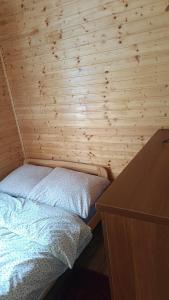 Postel nebo postele na pokoji v ubytování Ośrodek Wypoczynkowy "Słoneczko"