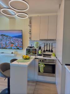 Η κουζίνα ή μικρή κουζίνα στο MG Homes