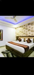 Postel nebo postele na pokoji v ubytování Hotel Beach side calangute