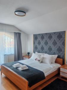 Postel nebo postele na pokoji v ubytování Apartman Kristian Zagreb Airport