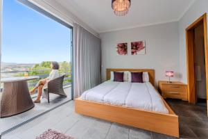 Ένα ή περισσότερα κρεβάτια σε δωμάτιο στο Rosa Luxury Villa BY YOUR KEY