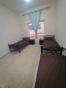 Χώρος καθιστικού στο سكن شباب بالتعاون - ALEX Hostel - Sharjah