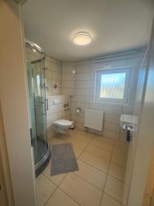 Ένα μπάνιο στο SUNSHINE Apartments Rust-Ringsheim +36 φωτογραφίες