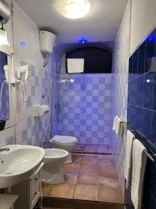 Koupelna v ubytování B&B La Dimora Di Nettuno + 14 fotografií