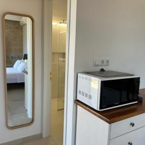 Posteľ alebo postele v izbe v ubytovaní Papanestoras Apartments
