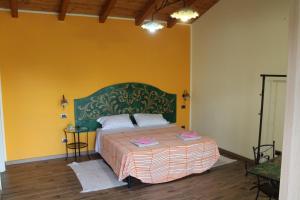 Postel nebo postele na pokoji v ubytování B&B La Tartaruga
