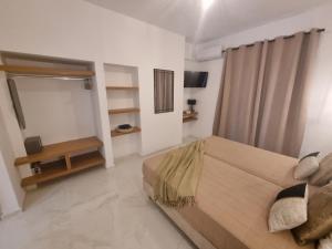 A television and/or entertainment centre at Olive Grove View