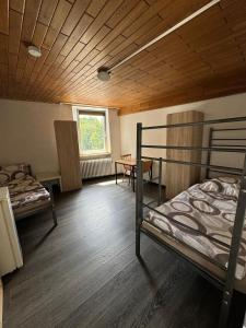 Ένα ή περισσότερα κρεβάτια σε δωμάτιο στο Privatzimmer in Rheinstetten