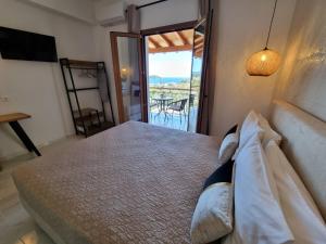 A bed or beds in a room at Olive Grove View