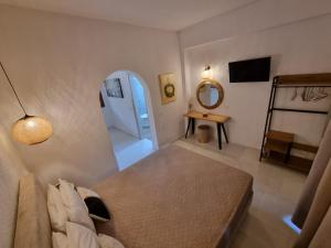 A bed or beds in a room at Olive Grove View