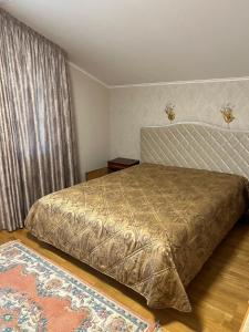 Кровать или кровати в номере Family holiday house with sauna