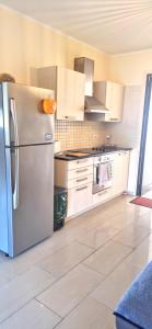 Кухня или мини-кухня в AFRODITI APARTMENTs
