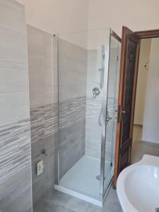 Koupelna v ubytování Fiordalisi home
