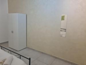 Postel nebo postele na pokoji v ubytování Fiordalisi home