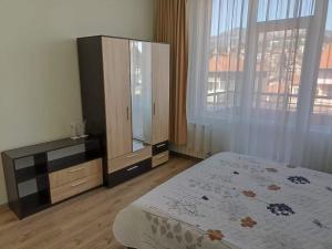 Postel nebo postele na pokoji v ubytování Приятелската къща