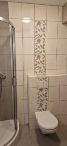 Kúpeľňa v ubytovaní Apartament Jedynka Villa Incognito
