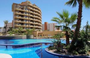 Bazén v ubytování Bella sirena Resort 2Rec condo con albercas y playa nebo v jeho okolí