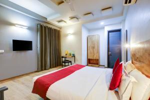 TV a/nebo společenská místnost v ubytování Hotel Wedlock Premium Huda City