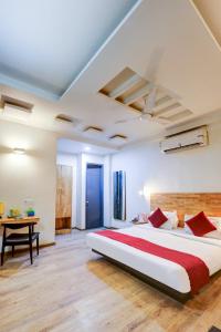 Postel nebo postele na pokoji v ubytování Hotel Wedlock Premium Huda City