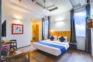 Postel nebo postele na pokoji v ubytování Hotel Wedlock Premium Huda City