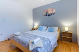Ліжко або ліжка в номері Apartment Kristian