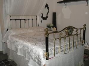 Postel nebo postele na pokoji v ubytování Paradise Traditional House