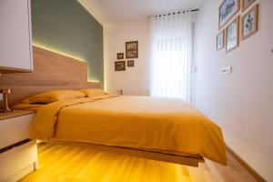 Letto o letti in una camera di Teo Divčigora
