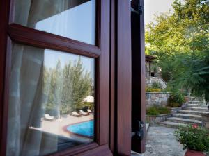 Bazén v ubytovaní Alonissos Muses Villas alebo v jeho blízkosti