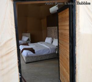 Ένα ή περισσότερα κρεβάτια σε δωμάτιο στο Adel rum camp bubbles