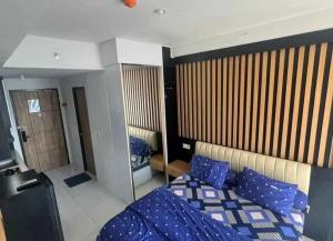 Postel nebo postele na pokoji v ubytování Delf Apartment CPI Makassar + 13 fotografií