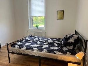 Postel nebo postele na pokoji v ubytování Live Smart in Altenburg Practical Apartments for Students and Workers