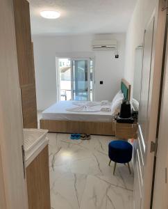 Ένα ή περισσότερα κρεβάτια σε δωμάτιο στο AC Aparthotel