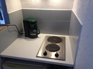 Kuchyň nebo kuchyňský kout v ubytování Appartement L'Atypique