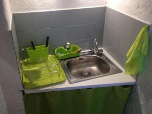 Kuchyň nebo kuchyňský kout v ubytování Appartement L'Atypique + 24 fotografií